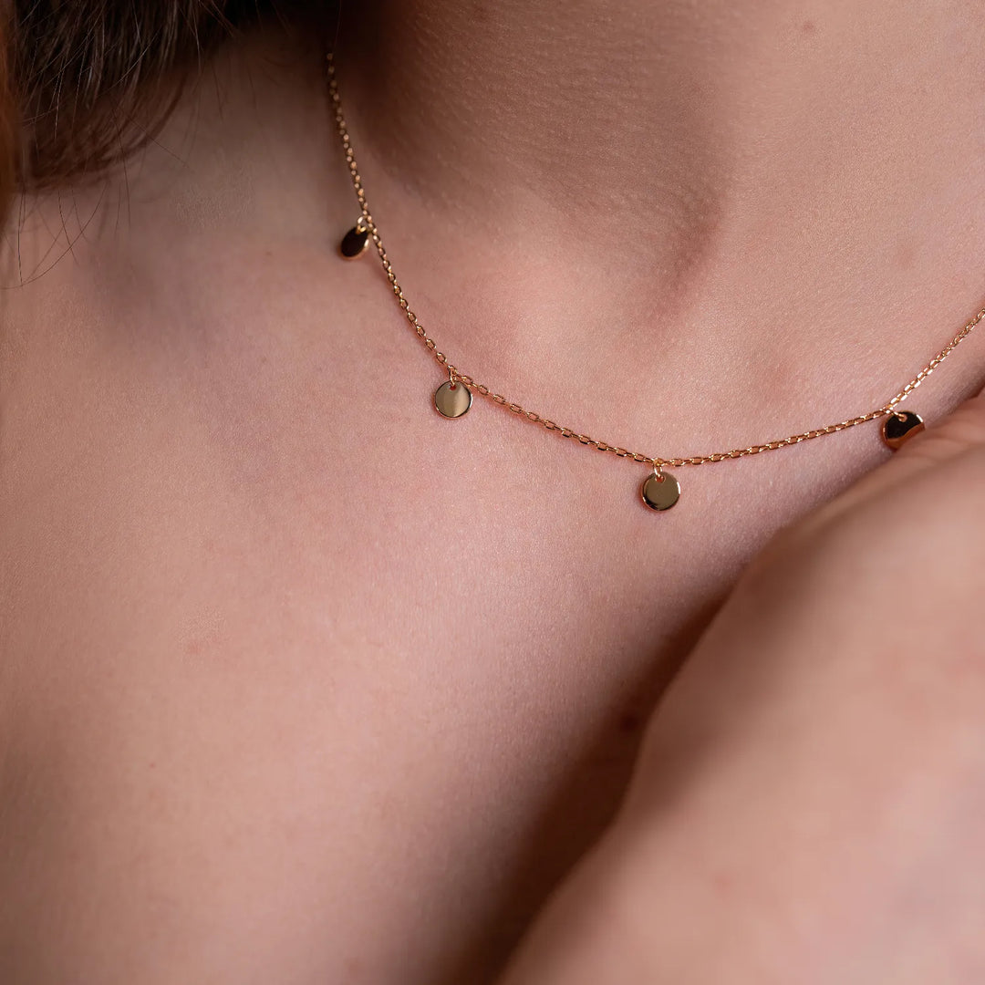 kette mit münzen anhänger