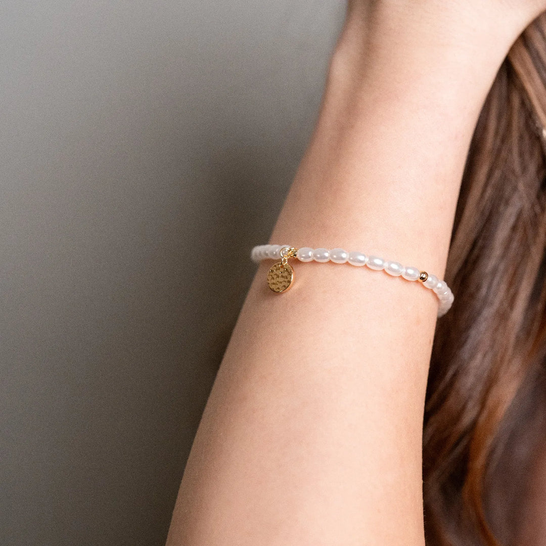 Origin of DXC Pearls Armband