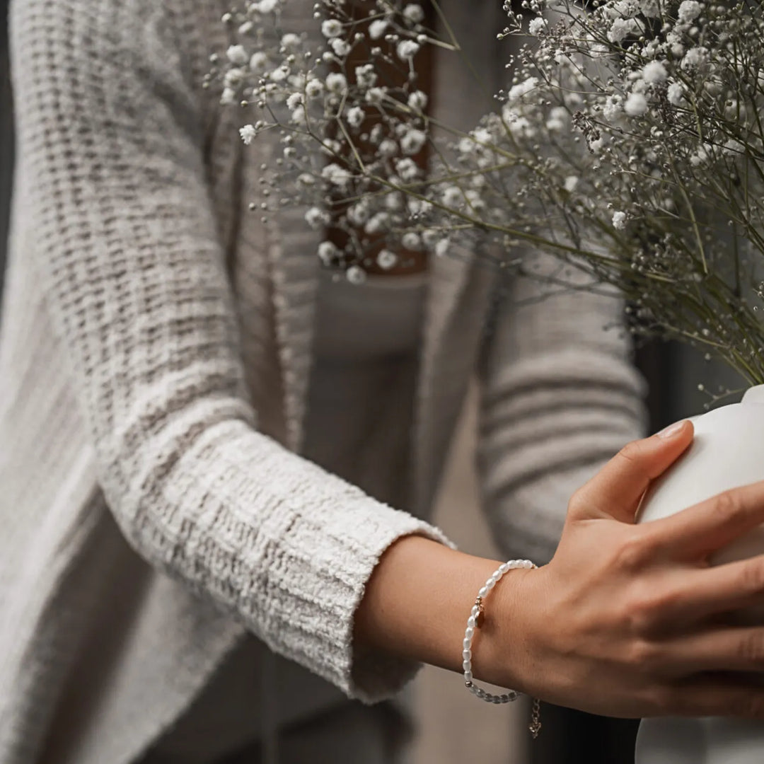 Origin of DXC Pearls Armband